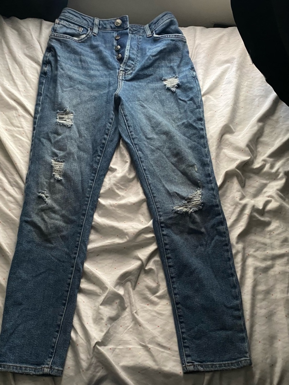 High-Rise Distressed Button-Fly Blue Jeans